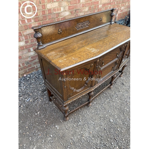 280 - An early 20th century oak buffet sideboard