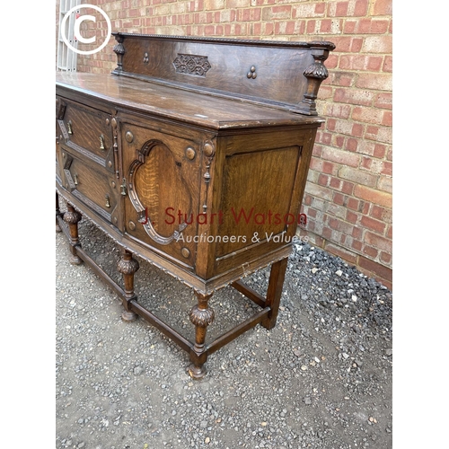 280 - An early 20th century oak buffet sideboard