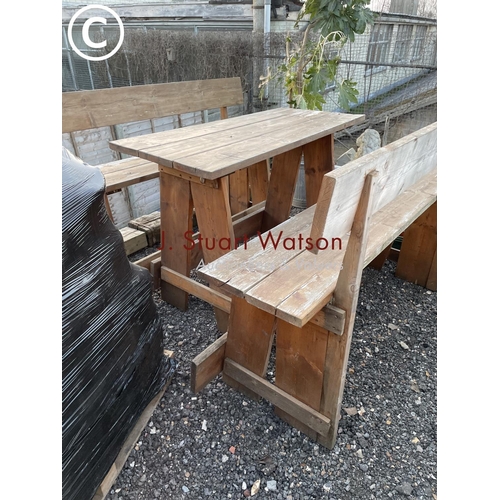 371 - An up cycled scaffold board oversized garden table and two benches