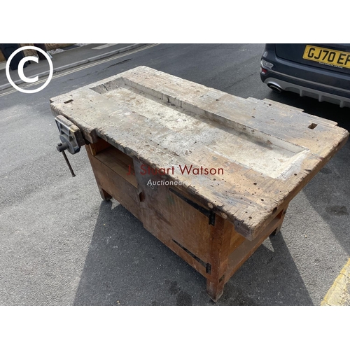 39 - A large vintage carpenters workshop bench fitted with vice and cupboard to each side 153x77x84