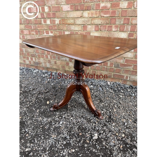 42 - A victorian mahogany snap top table