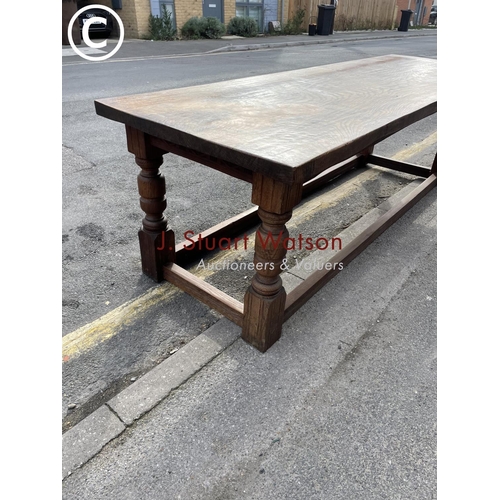 52 - A large oak refectory dining table 245x48x77