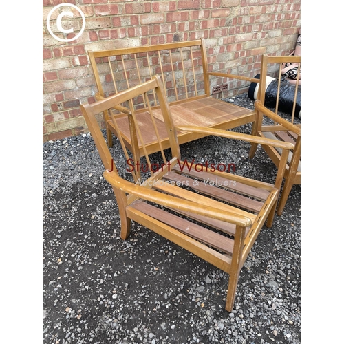 55 - A mid century teak lounge suite frame