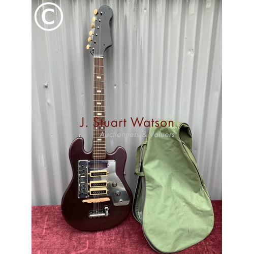 559 - Unmarked electric guitar and green soft case