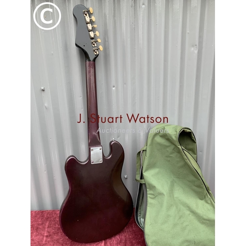 559 - Unmarked electric guitar and green soft case