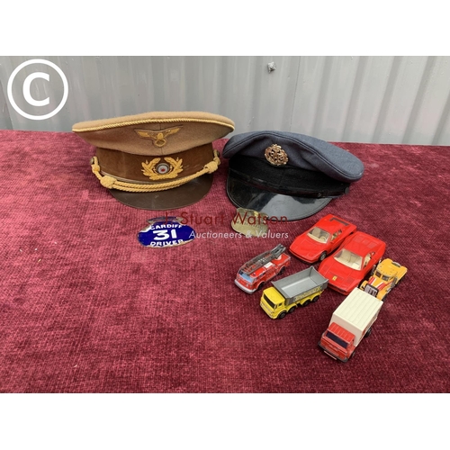 572 - 2 Military caps, 2 badges and 6 model vehicles