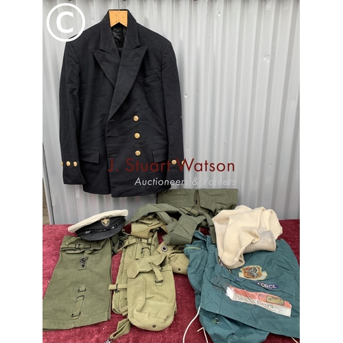 582 - Military suit and cap, waterproof cover, socks, and kit bags