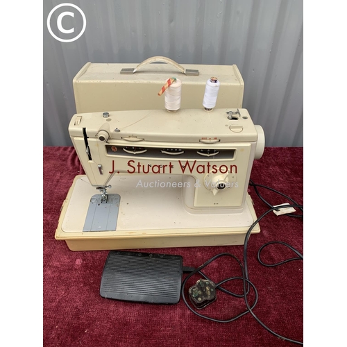 589 - Singer electric sewing machine