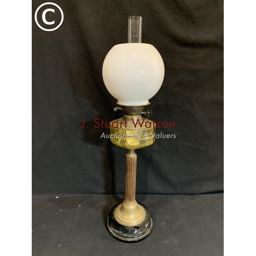 625 - Brass column oil lamp with green glass font height 73 cms