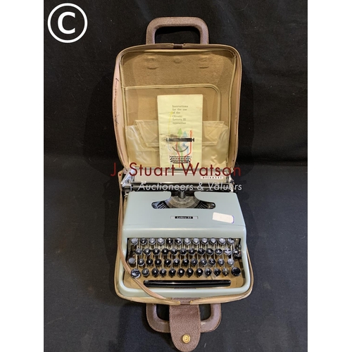 636 - Olivetti Lettera 22 cased portable typewriter