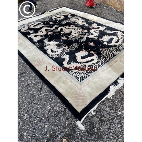 65 - A very large thick black chinese pattern carpet 2.7x3.8m