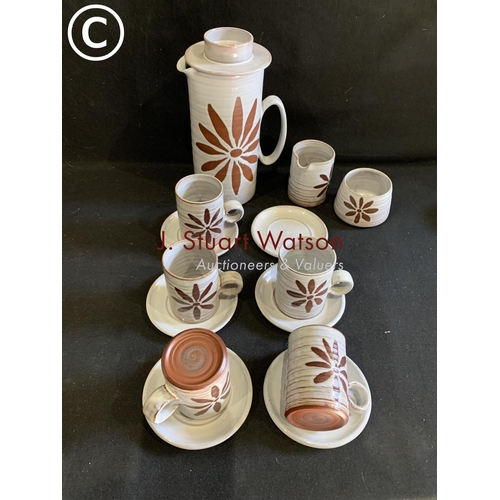 658 - Stoke Gabriel Devon pottery,  lotus pattern coffee set, lacking 1 cup