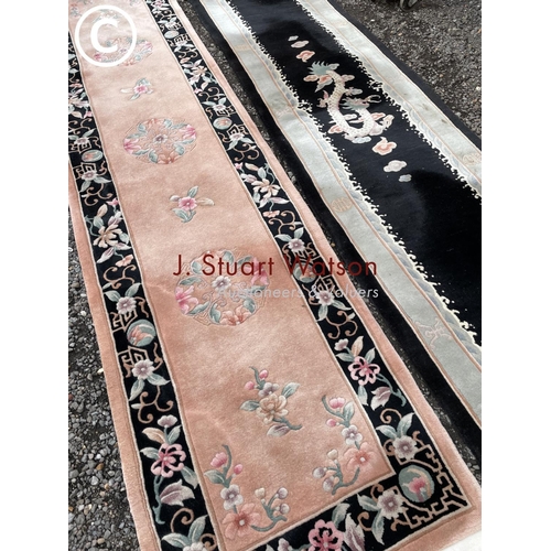 66 - Two black chinese pattern runners longest 3:8m