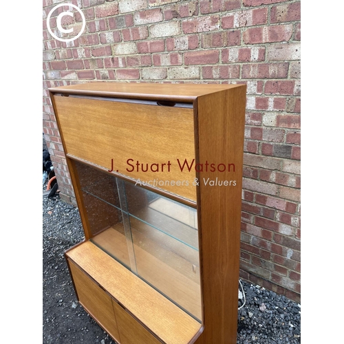 69 - A mid century teak cocktail lounge display cabinet 93cm wide