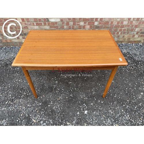 72 - A 1980's teak drawer leaf table made in Denmark by A.B.J