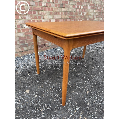 72 - A 1980's teak drawer leaf table made in Denmark by A.B.J