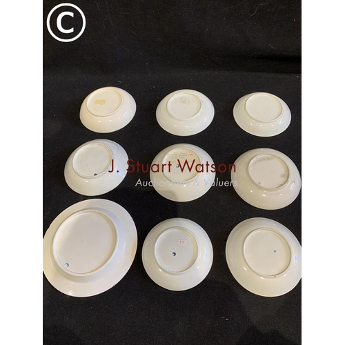 735 - Nine early Worcester blue and white saucers, various patterns