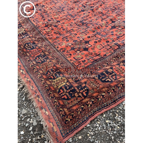 75 - A very large red pattern oriental rug 3.3x 2.3