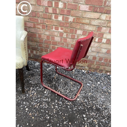 78 - A white vinyl chair together with a red metal framed chair