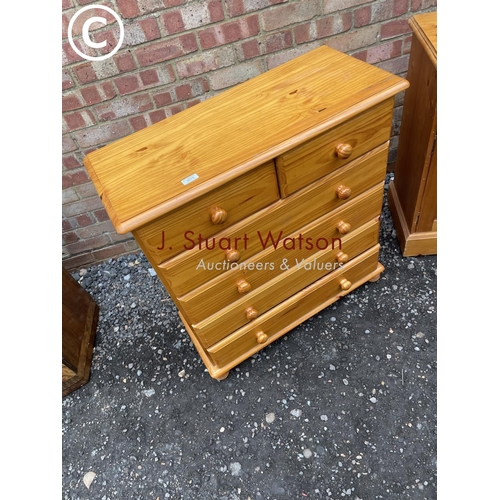 79 - A pine chest of five drawers together with a pine two drawer sideboard