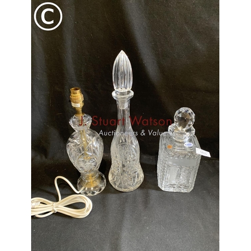 800 - Two cut glass decanters (no damage) and cut glass lamp base