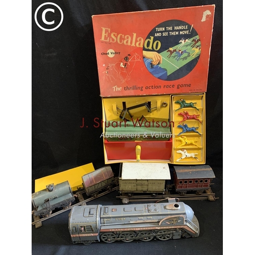 809 - Battery operated tin plate train, four O guage wagons and boxed Escalado game with five horses