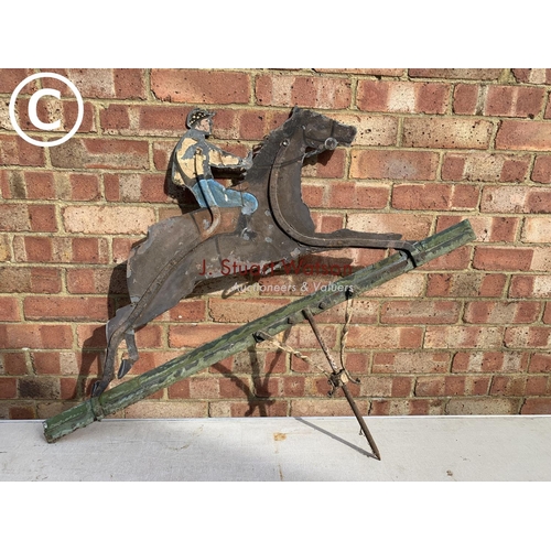 830 - Antique wrought iron weather vane with painted zinc figure depicting jockey on horse back,  height 1... 