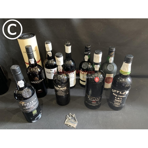 849 - Nine bottles of assorted Port and Port label