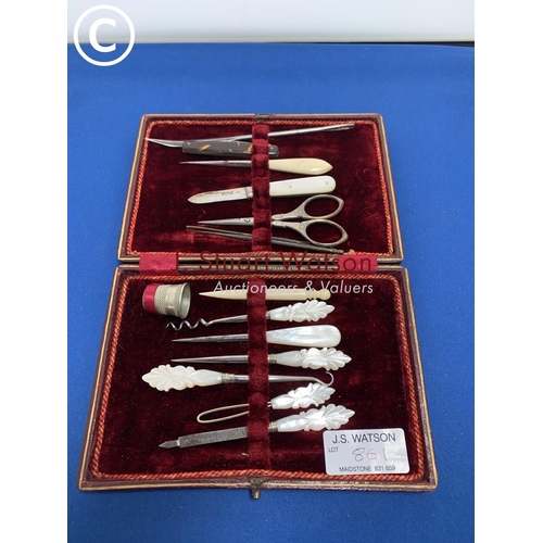 861 - Red leather cased manicure set