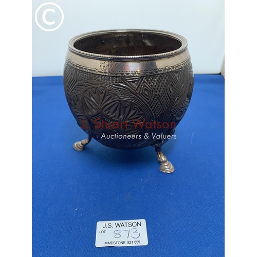 873 - Antique carved Coconut shell fitted with unmarked white metal mounts (age crack to body)