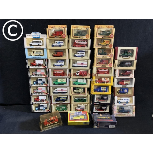 898 - Forty five Lledo and other boxed Die cast models including 16 Kimberley Clark Kleenex editions