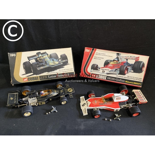 904 - Two boxed original Corgi Racing Cars: JPS Lotus formula 1 and Texaco-Marlboro McLaren M23F1