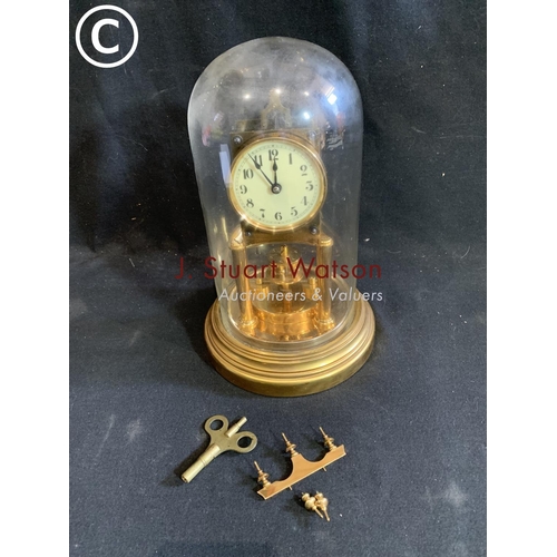 920 - Glass domed Anniversary clock a/f with key