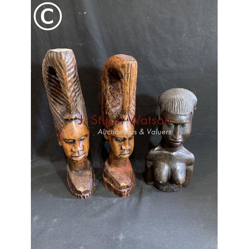 925 - Three carved ethnic busts tallest 46 cms