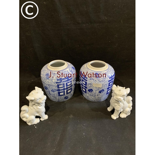 954 - Pair of Chinese blue and white jars height 20 cms and pair of Dogs of Fo