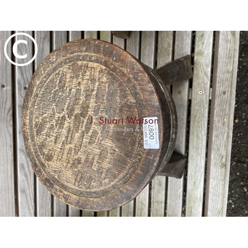 97 - A pair of hand made oak milking stools by jack grimble of Cromer top diameter 27cm 35 cm high