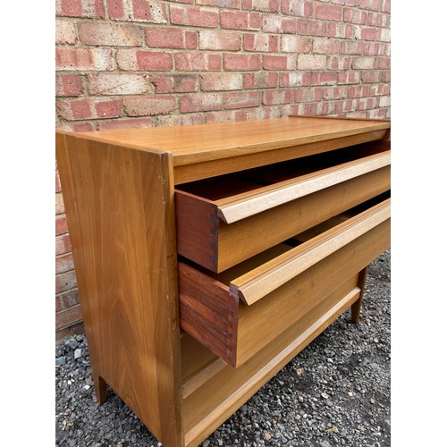 5 - A mid century teak chest of five drawers