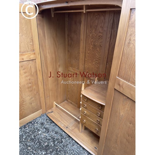 6 - An original ercol elm double wardrobe with a part fitted interior of four drawers (possible to disma... 