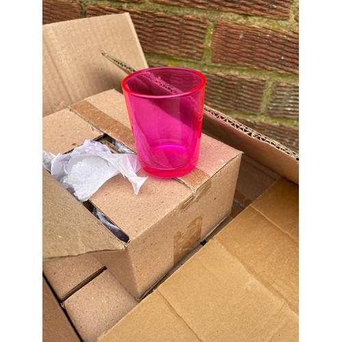 390 - A box containing 72 pink glass tea lights