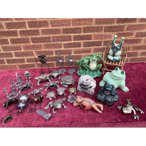 396 - Collection of metal, wooden and ceramic frog figures