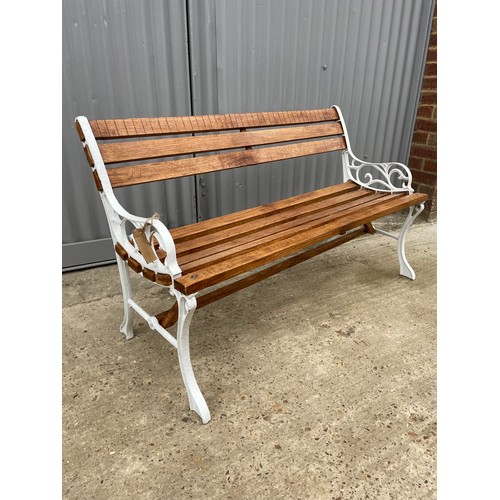 382 - A refurbished iron framed garden bench with varnished slatted seat