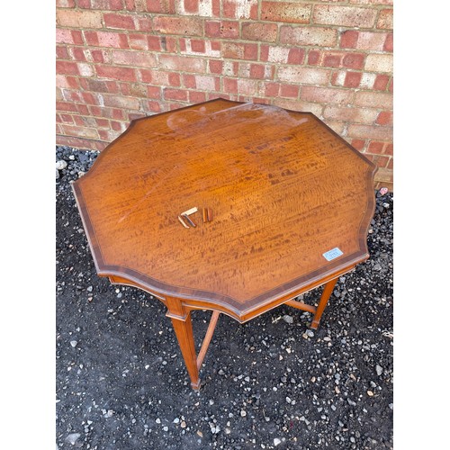 163 - A Victorian satinwood occasional  Table