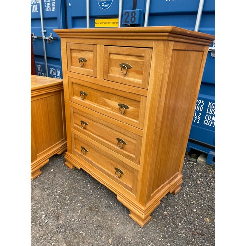 298 - A good quality American light oak Bedroom pair consisting of tallboy chest of five together with dre... 