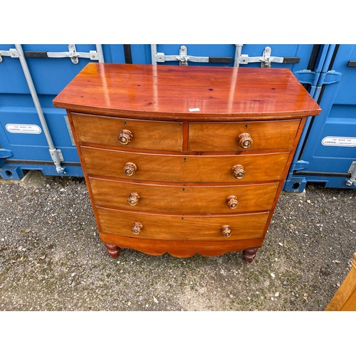 301 - A Victorian mahogany bow fronted chest of five drawers with tiger stripe handles