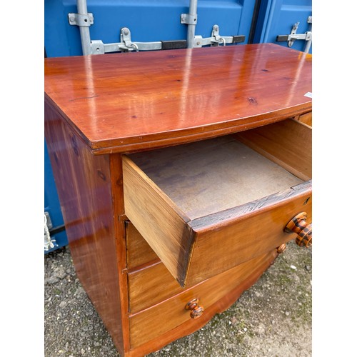 301 - A Victorian mahogany bow fronted chest of five drawers with tiger stripe handles