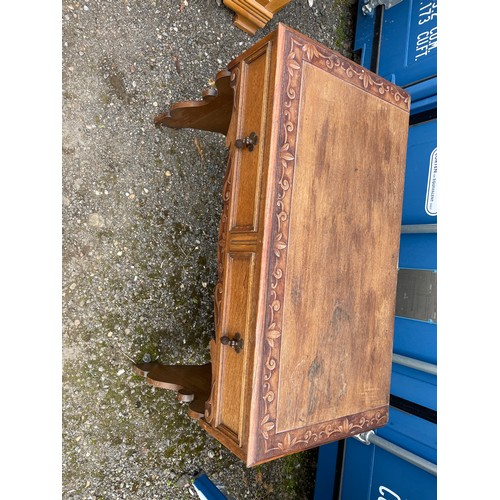 302 - An oak two drawer side table