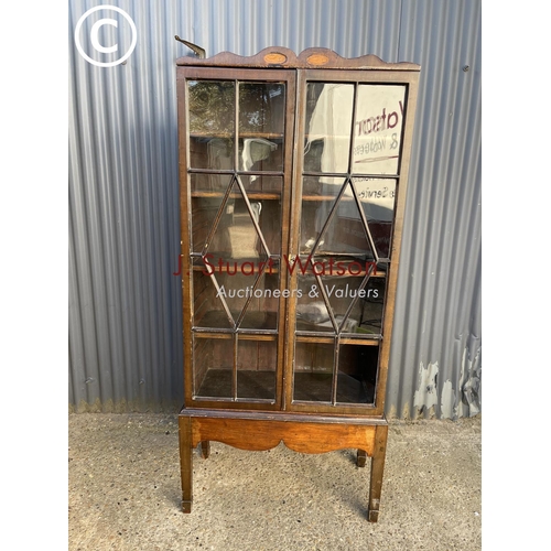 8 - A Victorian mahogany glazed bookcase with satinwood inlay and four adjustable shelves 81x35 x182