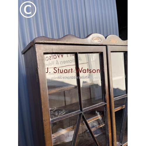 8 - A Victorian mahogany glazed bookcase with satinwood inlay and four adjustable shelves 81x35 x182