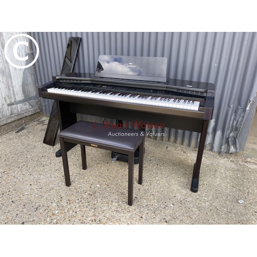 12 - A Yamaha clavinova CVP35 electric piano