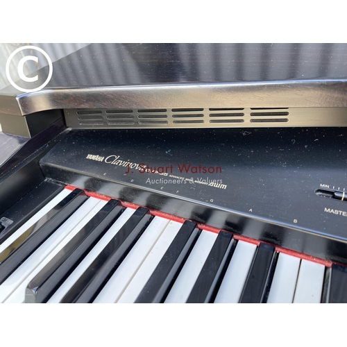 12 - A Yamaha clavinova CVP35 electric piano